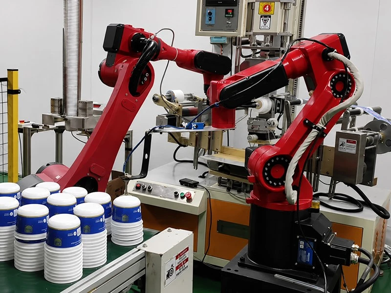 Dual-Robot Collaborative Loading and Unloading for Screen Printing Dual-Robot Collaborative Loading and Unloading for Screen Printing